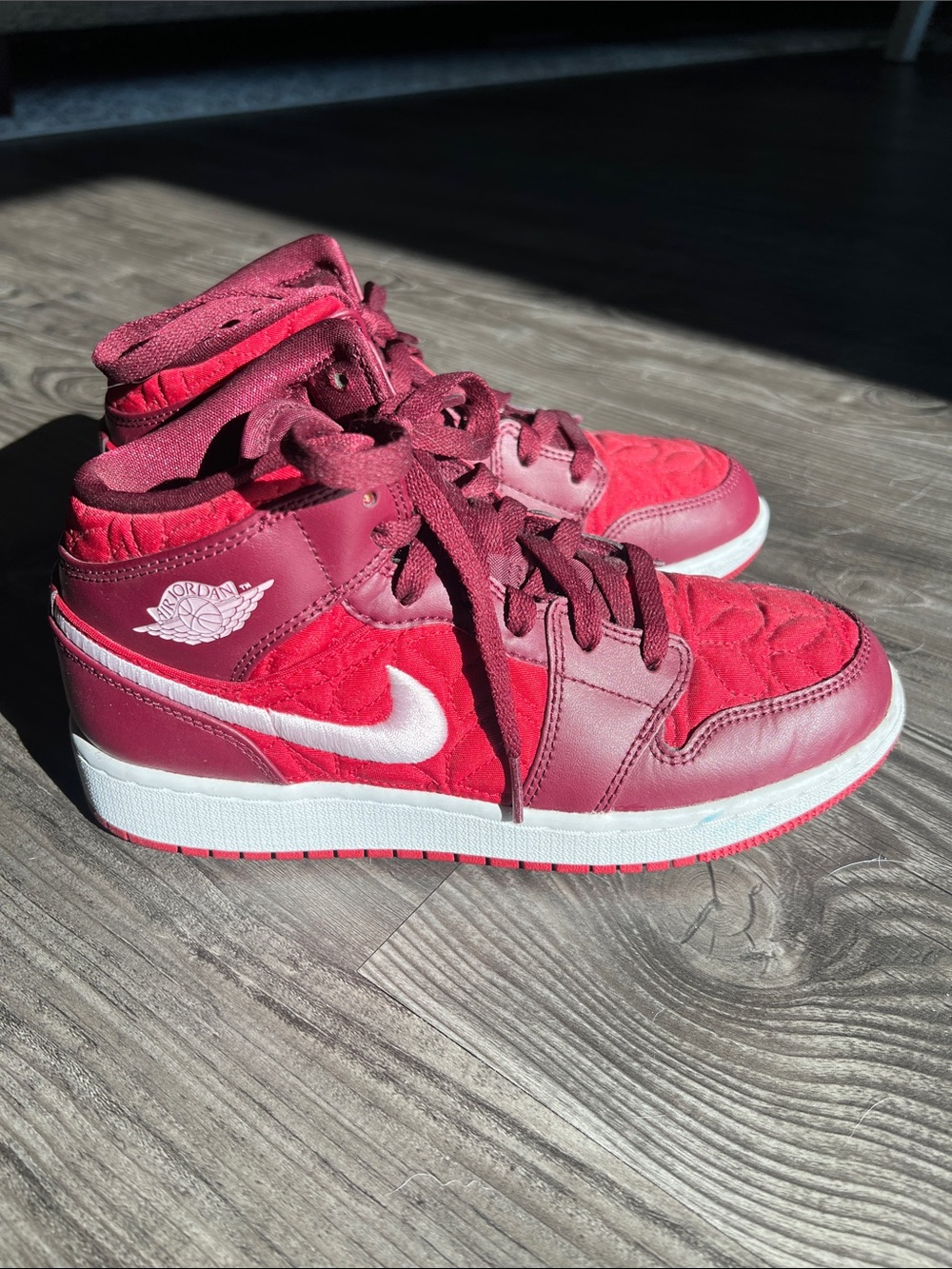Jordan Women's High-Top Sneakers in Red and Maroon